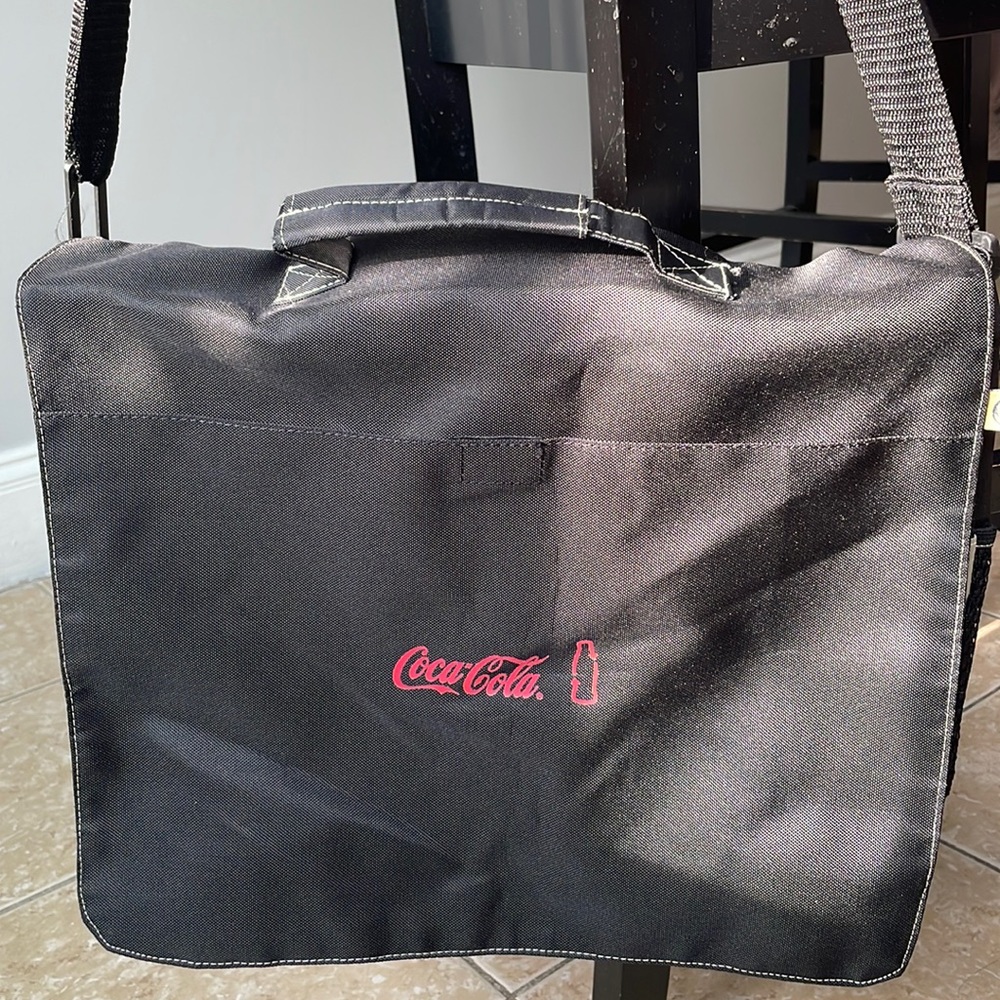 COCA’COLA Messenger Flap Over Bag in black color